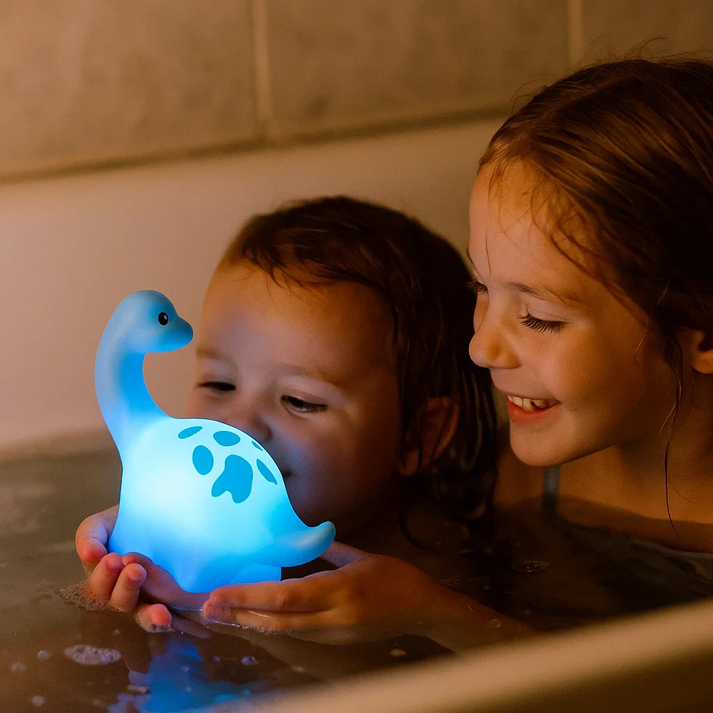 Lysande badleksak dinosaurie